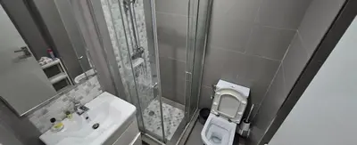 a small bathroom with a toilet and a sink at Résidences Mansbay Jasmin in Mansouria