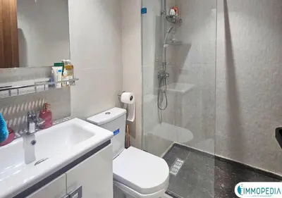 a bathroom with a shower and a toilet and a sink at Évasion de Charme à El Mansouria in Mansouria