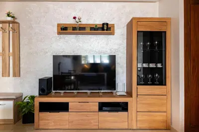 a entertainment center with a flat screen tv at Casa Lilas Free Parking & Gym & Optical Fiber Oldtown 5 mn Walk in Rabat