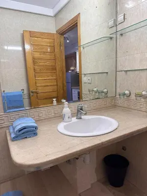 a bathroom counter with a sink and a mirror at Studio au cœur du centre ville de Casablanca in Casablanca