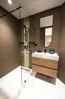 a bathroom with a sink and a shower at New - Cosy central Casablanca apartment in Casablanca