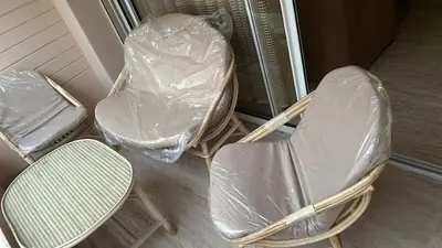 a couple of chairs with plastic wrapped around them at Appartement haut standing Mohammedia Parc in Mohammedia