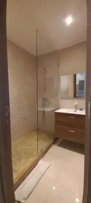 a bathroom with a shower and a sink at Cozy 1BR 1BA Retreat in Casablanca