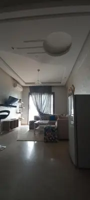 a living room with a couch and a bed at Cozy 1BR 1BA Retreat in Casablanca