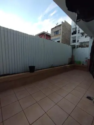 a patio with a fence and a tile floor at Cozy 1-BR with Large Terrace in Casablanca