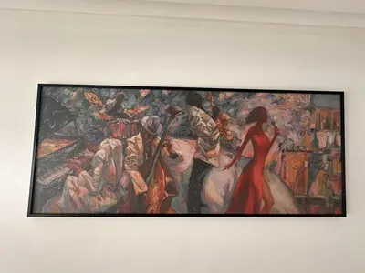 a painting hanging on a wall at Appartement luxueux prestigia in Rabat