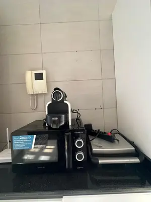 a coffee maker on a counter in a room at Appartement luxueux prestigia in Rabat