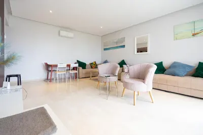 a living room with a couch and chairs and a table at Ocean Pearl Luxury Stay by Sea in Casablanca