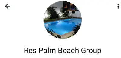 a picture of a swimming pool with the words rres palm beach group at الهرهورة in Oulad Kerroum