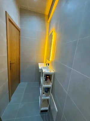 a bathroom with a sink and a mirror at Ksar Labhar Second Nest in Rabat