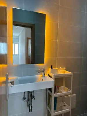 a bathroom with a sink and a mirror at Ksar Labhar Second Nest in Rabat