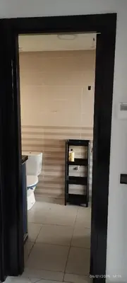a bathroom with a white toilet in a room at المنصورية in Mohammedia