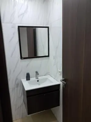 a bathroom with a sink and a mirror at Pierro in Maarif