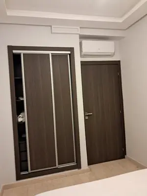 a room with two glass doors and a ceiling at Pierro in Maarif
