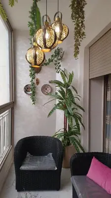 a living room with a couch and a chandelier at Lovely & Comfy Long and Short Stay at Nouacer-Casa 2-Bedroom Apartment in Nouaceur