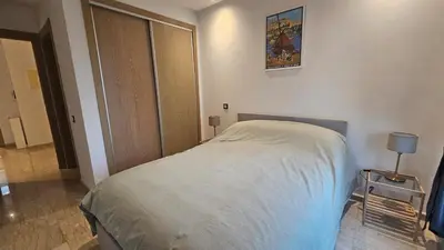 a bedroom with a bed in a room at Apartment with terrace - Strategic location in Casablanca