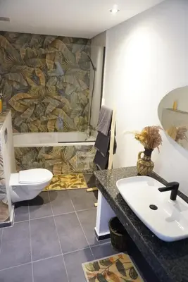 a bathroom with a sink and a toilet at Chez vous au cœur de Casablanca in Casablanca