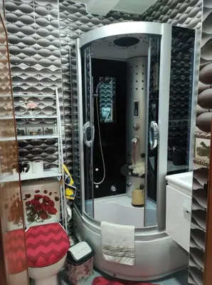 a bathroom with a shower and a toilet and a sink at Charming Moroccan apartment ground floor 2 bedrooms 1 living room in Casablanca