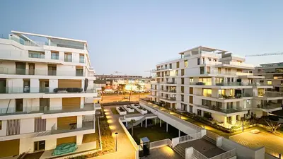 an aerial view of a building with a pool at le carrousel Residence Rabat in Rabat