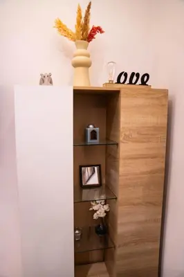 a wooden shelf with a vase on top of it at R103- Comfy and Spatious 1 BR Apartment with Breathtaking City View - Belvédère in Casablanca