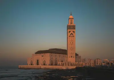 a large building with a clock tower on top of it at R103- Comfy and Spatious 1 BR Apartment with Breathtaking City View - Belvédère in Casablanca