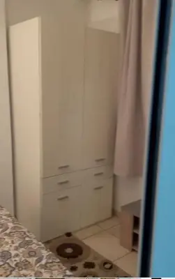 a bedroom with a white dresser and a bed at Un petit studio in Settat