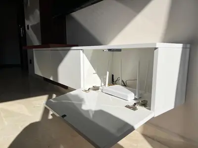 a white cabinet with a mirror on top of it at Emplacement Central & Lumineux au Coeur De Casablanca Près Du Tramway 1 minute du Bd Abdelmoumen Maarif et 5 Minutes de Bab Marrakech et Centre Ville in Casablanca