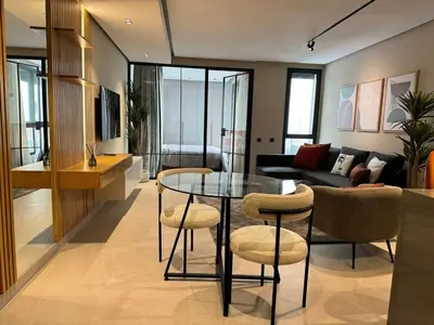 a living room with a table and chairs and a couch at الدار بيضاء in Casablanca