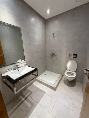 a bathroom with a toilet and a sink at superbe appart a dar bouaza tamaris avec piscine in Casablanca