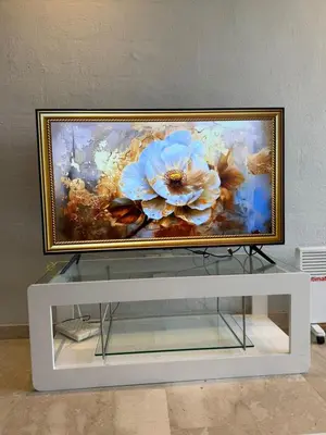 a painting of flowers on top of a table at superbe appart a dar bouaza tamaris avec piscine in Casablanca