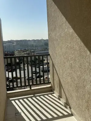 a balcony with a view of a city at Stylish Cozy Condo Downtown City Center Casablanca in Casablanca