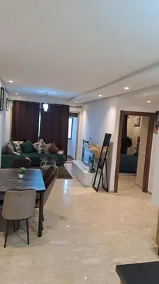 a living room with a couch and a table at Studio 27 in Casablanca
