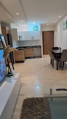 a living room with a kitchen and a dining room at Studio 27 in Casablanca