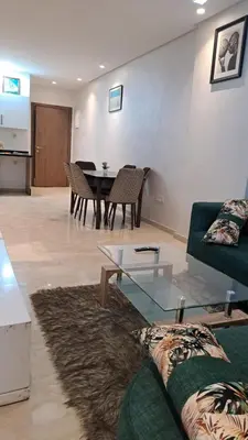 a living room with a couch and a table at Studio 27 in Casablanca