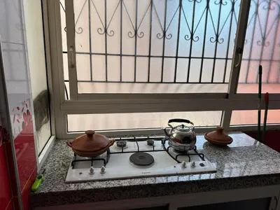 a stove with two tea pots on top of it at Hyatt Residence Casa Voyageur in Casablanca