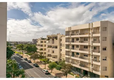 an apartment building with a street in front of it at Cosy cocon urbain 34 in Rabat