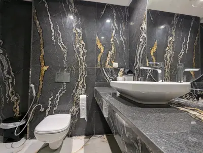 a bathroom with a sink and a toilet at Seafront Luxury Villa with Amazing pool! in Dar Bouazza