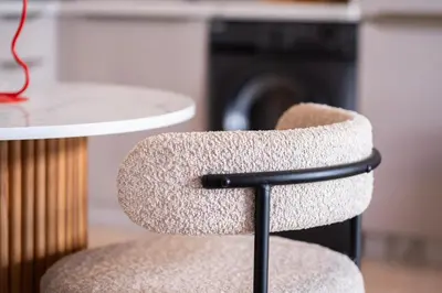a chair in a kitchen with a table at Premium Stay - Lux Housing Bourgogne in Casablanca