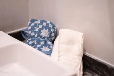 a room with blue and white pillows in a corner at Premium Stay - Lux Housing Bourgogne in Casablanca