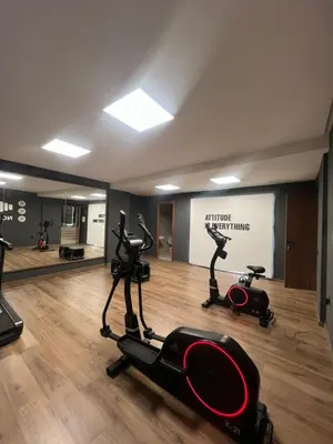 a gym with two exercise bikes in a room at studio tout confort, près de la corniche Casablanca in Casablanca