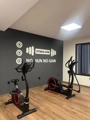 a gym with two exercise bikes in a room at studio tout confort, près de la corniche Casablanca in Casablanca