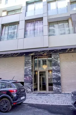 a car parked in front of a building at Les Princesse superbe Studio neuf moderne in Casablanca