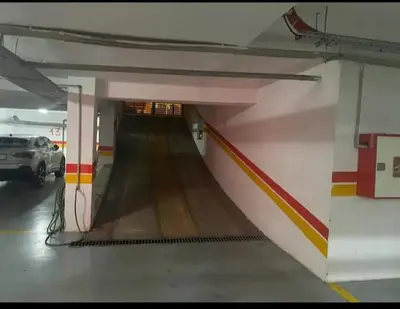 an empty parking garage with a car parked in it at Les Princesse superbe Studio neuf moderne in Casablanca
