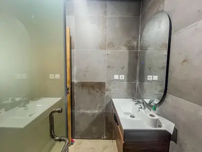 a bathroom with a sink and a mirror at Central and Practical Studio - Boulevard d'Anfa in Casablanca