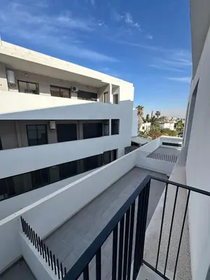 a balcony with a view of a building at Appartement Casablanca in Casablanca