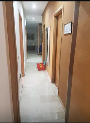 an empty hallway with a hallwayngthngthngthngthngthngthngthngthngthngth at Rabat prestigia hayriad in Rabat