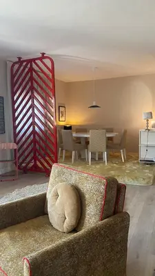 a living room with a couch and a table at Spacious Apartment In CIL Casablanca in Casablanca