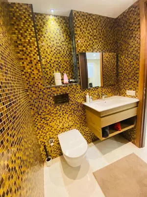 a bathroom with a toilet and a sink at Atlantic Suite View 4 in Casablanca