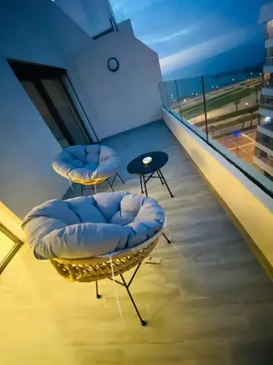 two chairs and a table on the top of a building at Atlantic Suite View 4 in Casablanca