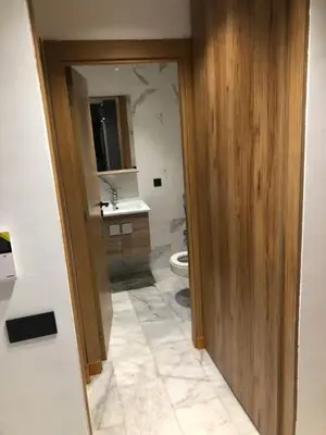 a bathroom with a toilet and a sink at Abbogroup Appartement 2 in Casablanca
